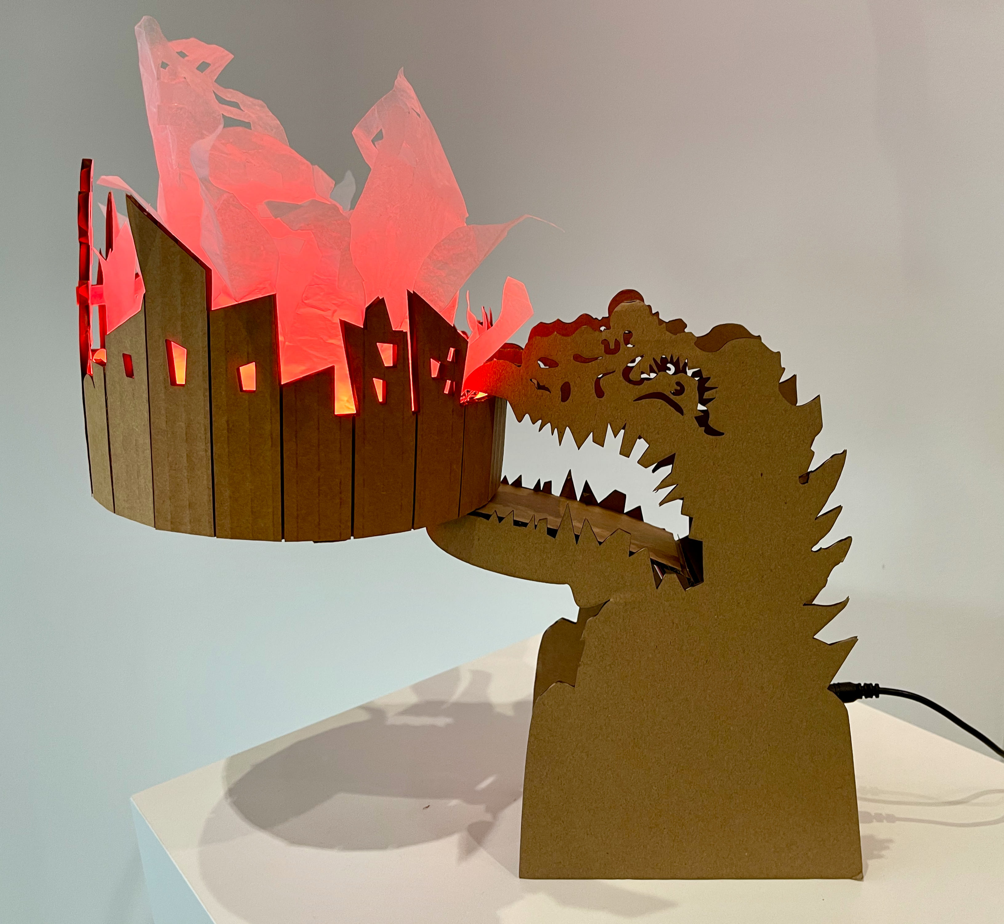 Godzilla. laser cut cardboard, Arduino, NeoPixel LED ring